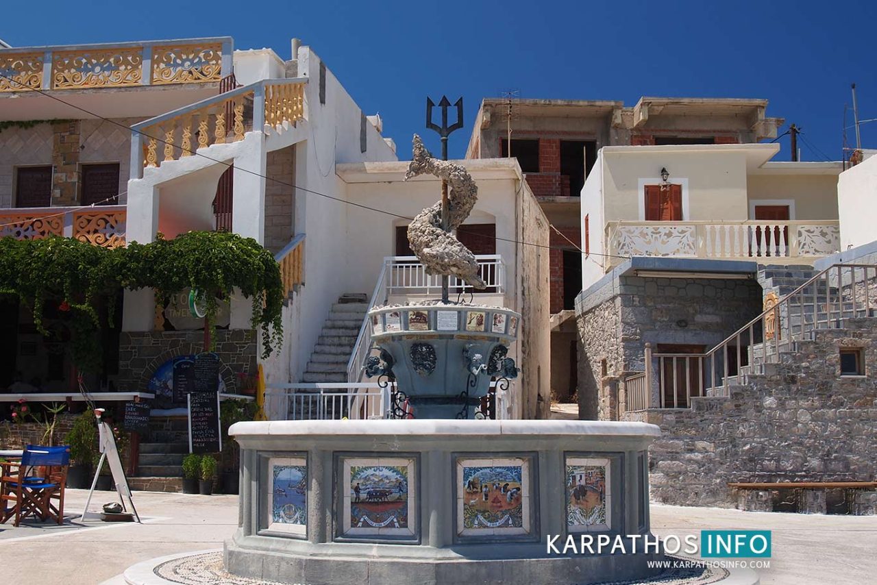 What to see in Diafani, sights and attractions, dolphin statue in Karpathos island